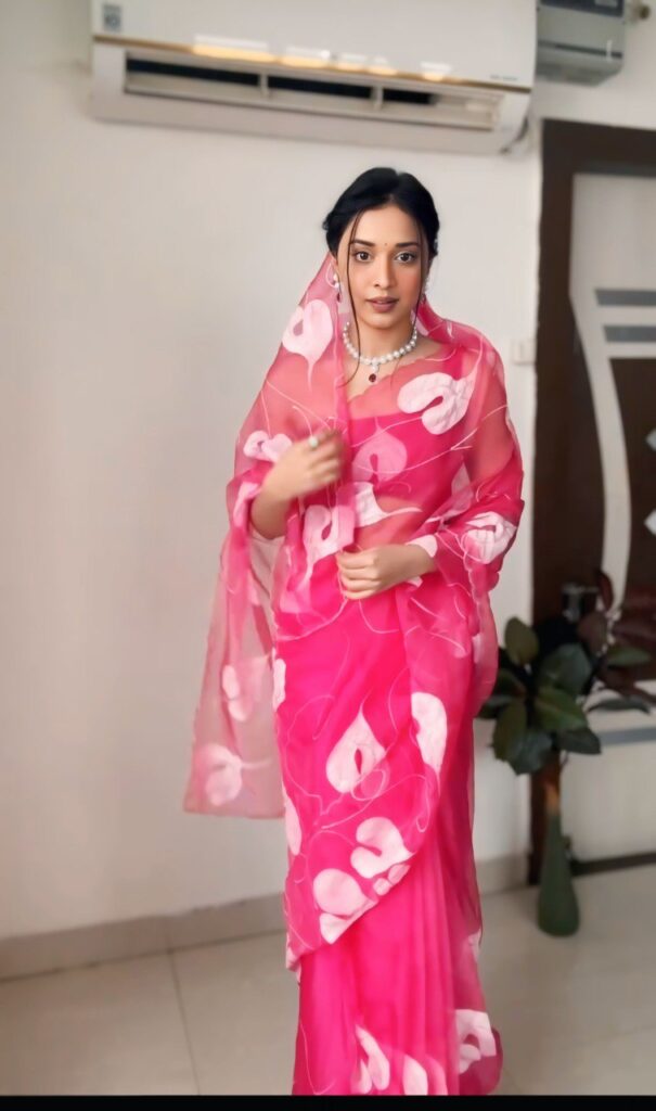 peach color organza printed saree with unstitched blouse