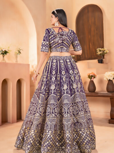 wine net lehenga choli with golden zari embroidery