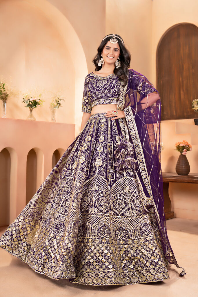 wine net lehenga choli with golden zari embroidery