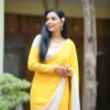 yellow & white printed georgette saree with unstitched blouse
