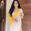 yellow & white printed georgette saree with unstitched blouse