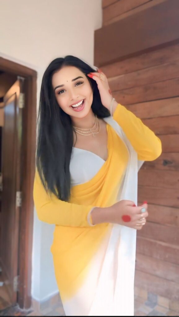 yellow & white printed georgette saree with unstitched blouse