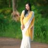 yellow & white printed georgette saree with unstitched blouse