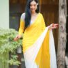 yellow & white printed georgette saree with unstitched blouse