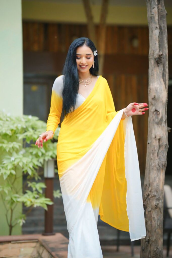 yellow & white printed georgette saree with unstitched blouse